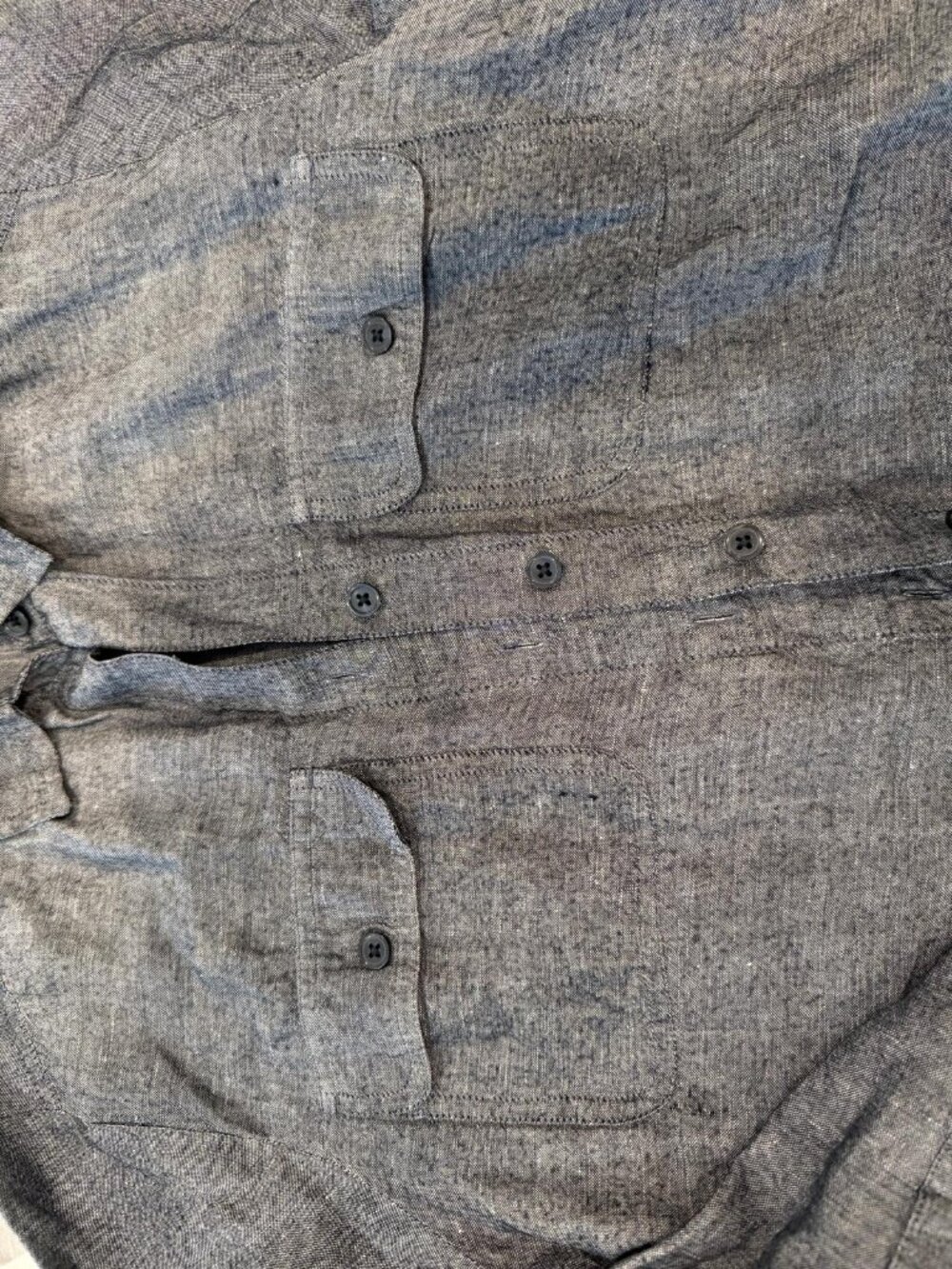 This item is a women's dark grey/blue chambray button-down shirt from Ann Taylor - Picture 4 of 5
